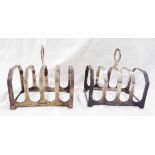 A pair of 7.5cm silver toast racks with canted dividers - Birmingham 1992
