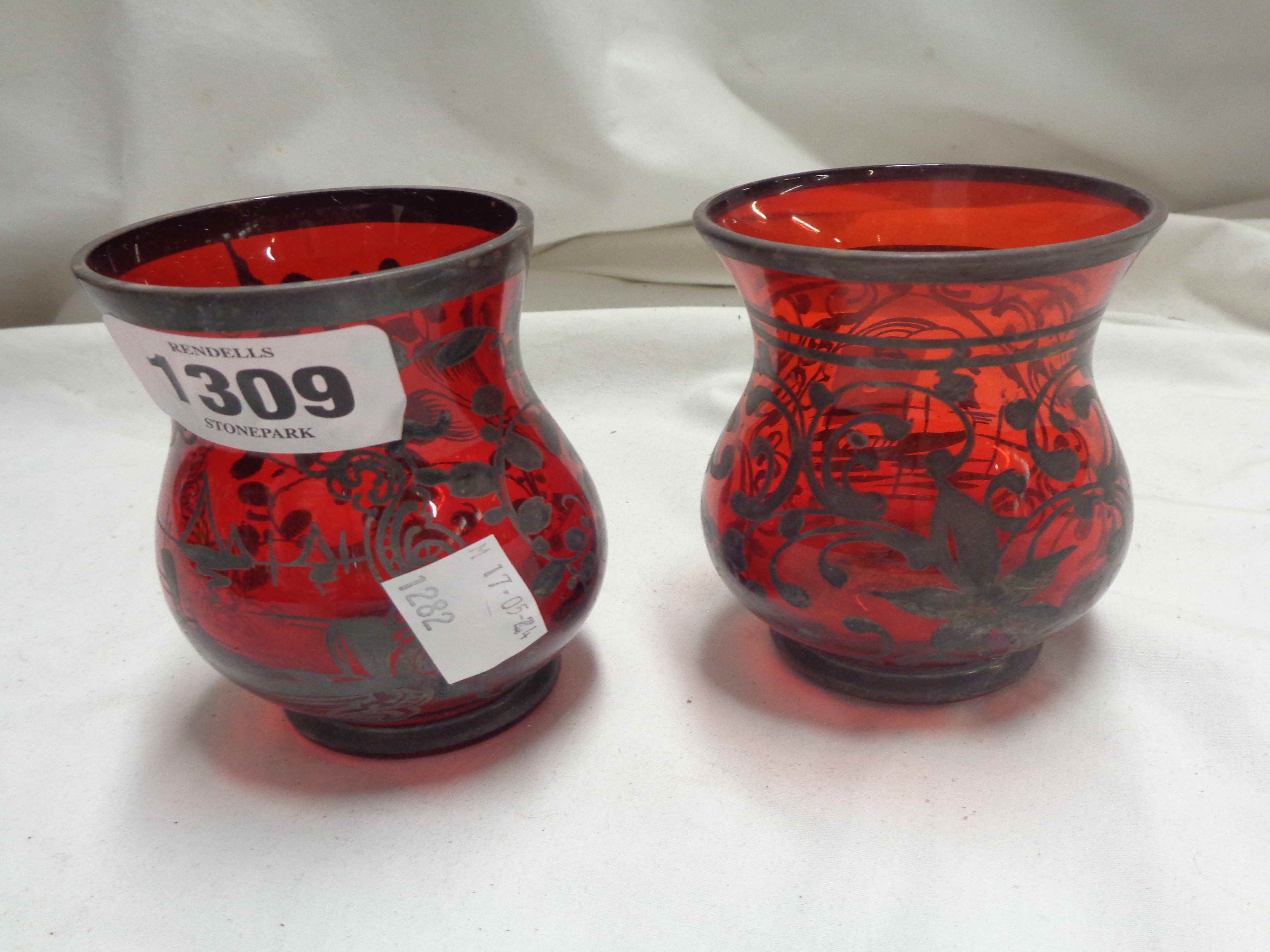 A pair of Venitian ruby glass vases with painted silver lustre decoration