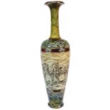 A Doulton Lambeth slender bulbous vase with incised horse group decoration by Hannah Barlow -