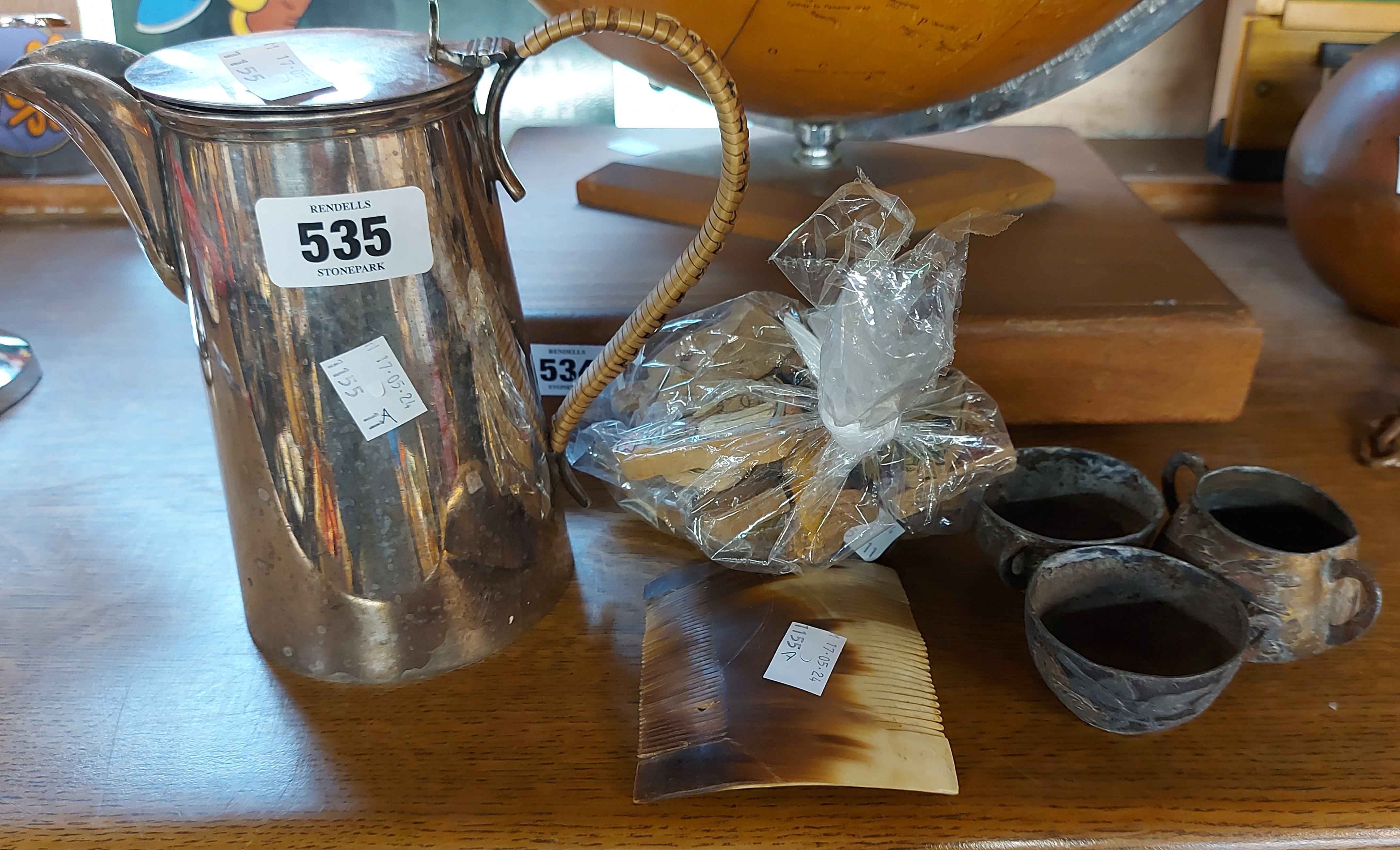 An EPNS coffee pot with wicker handle - sold with a horn hair comb, small bag of wooden toys, etc.