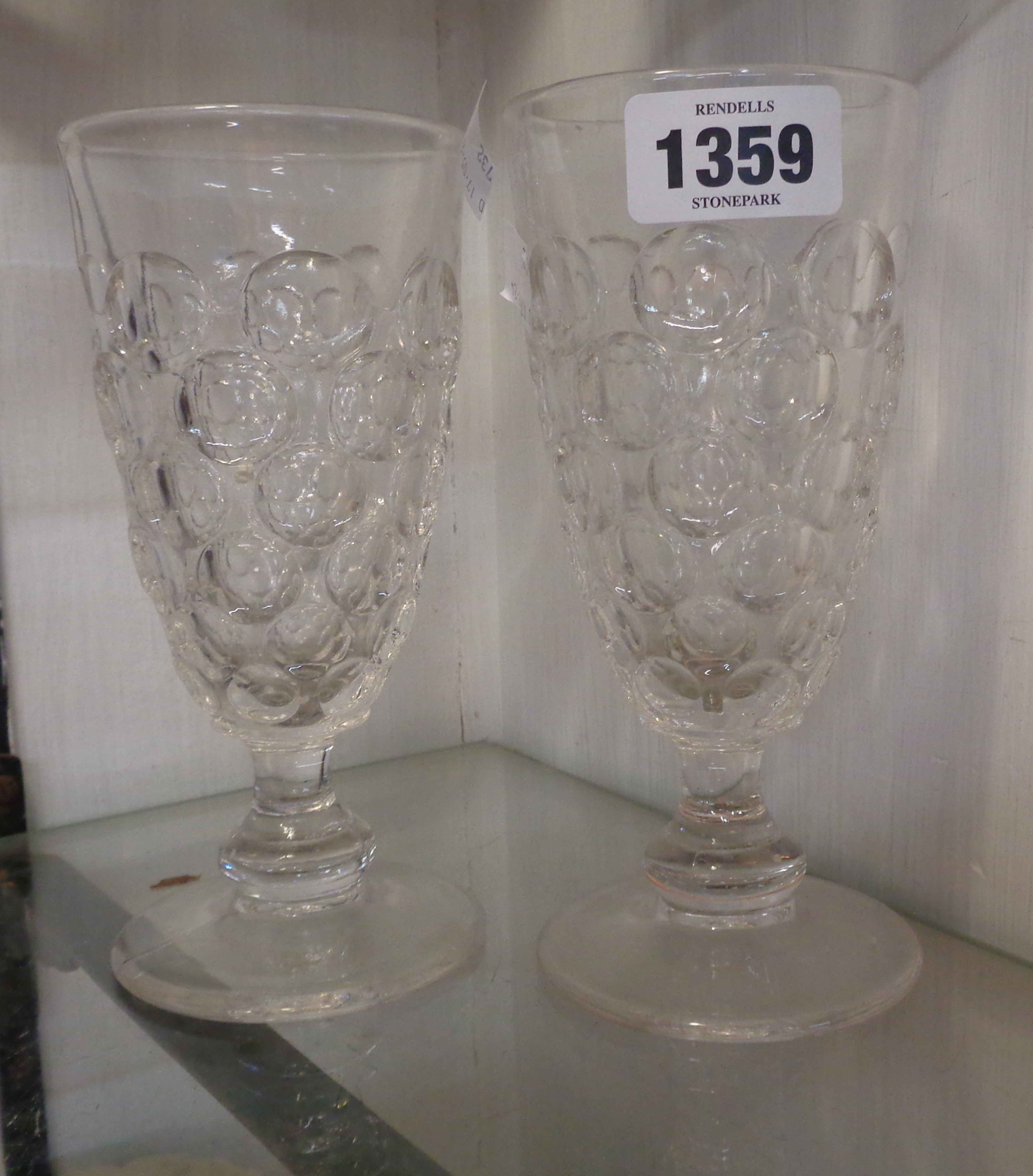 A pair of late 19th Century blow moulded rummers of tall goblet form