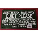 A modern painted cast iron 'Quiet Please' sign