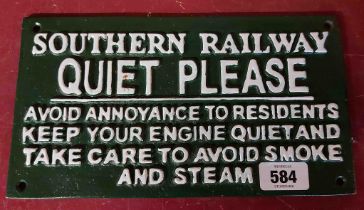 A modern painted cast iron 'Quiet Please' sign