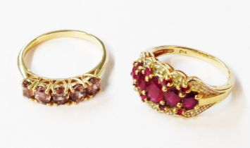 A vintage style yellow metal ring, set with five graduated heat treated rubies and tiny diamonds