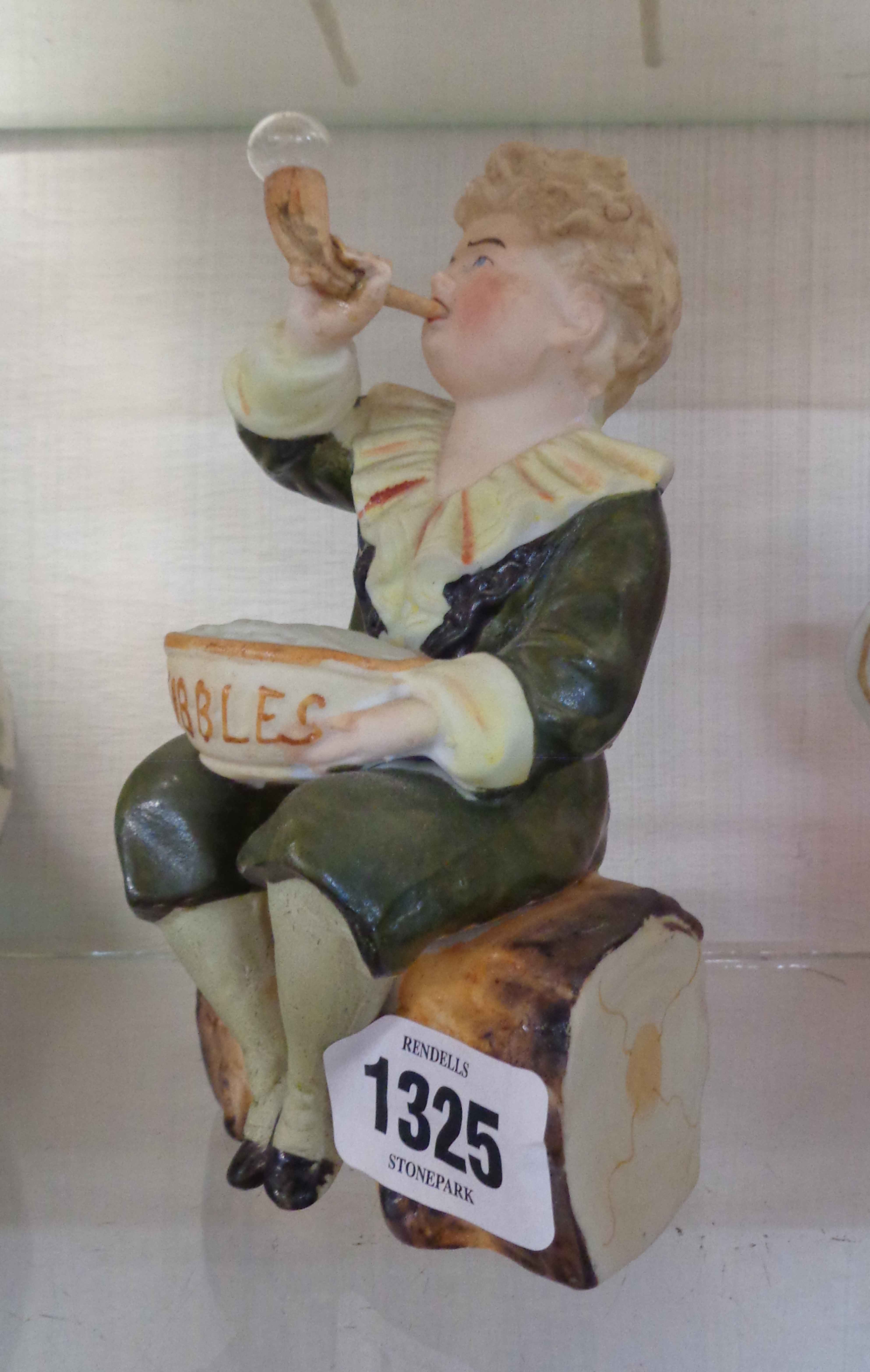 A late 19th/early 20th Century German painted bisque porcelain Pears Soap advertising figurine,