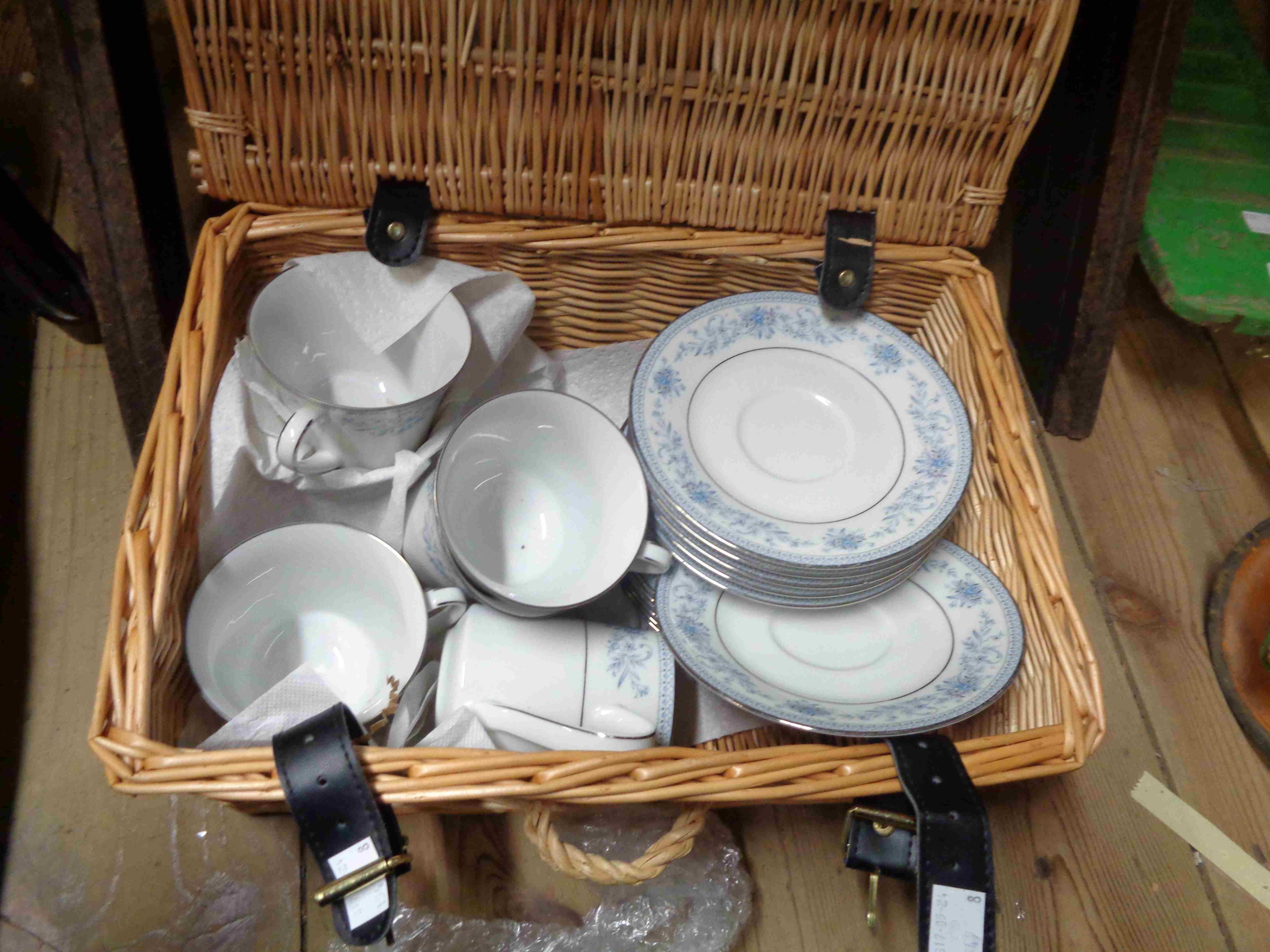 A small wicker hamper containing a quantity of Noritake teaware