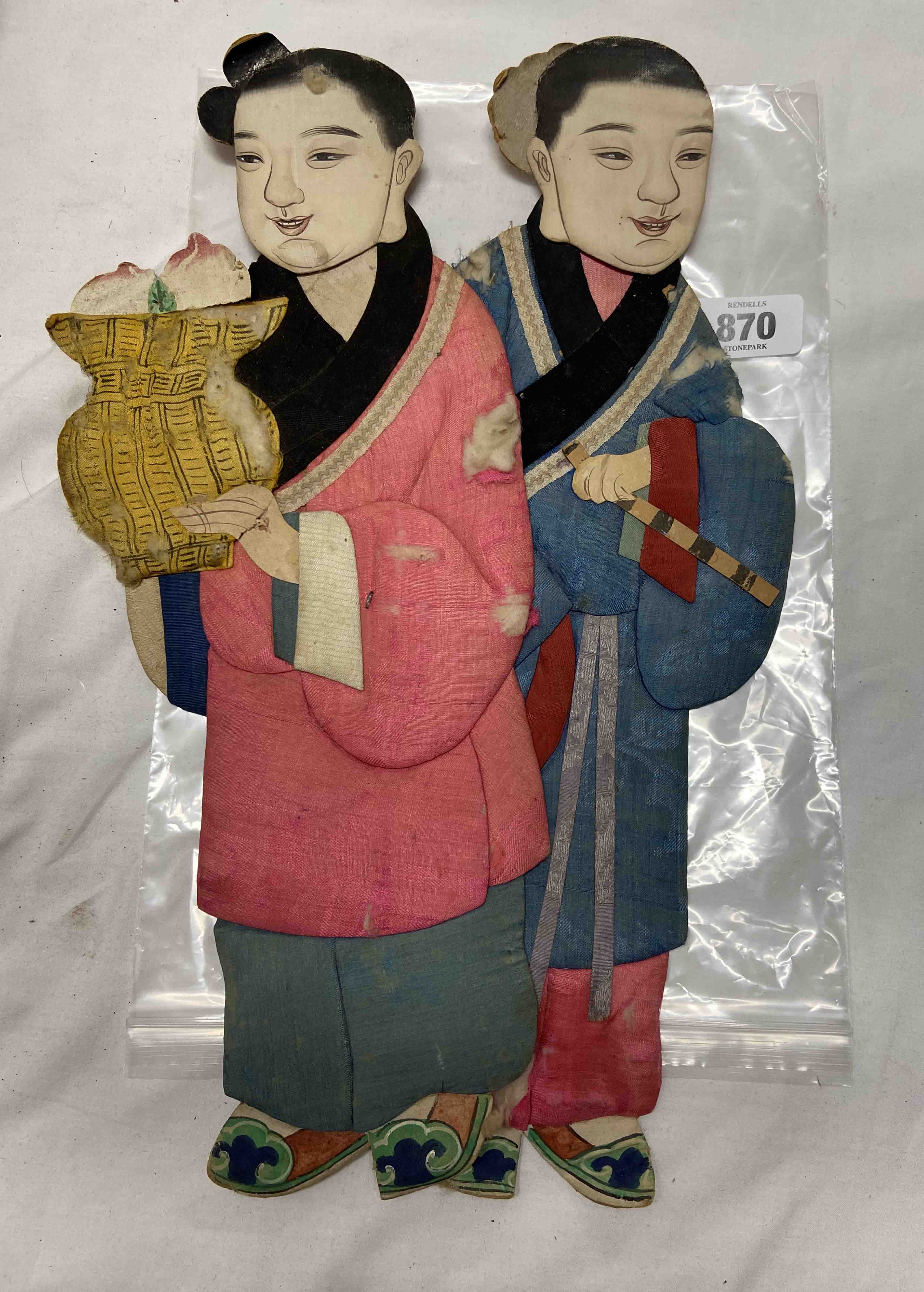 A pair of old Chinese silk on card figures, depicting men in traditional attire with vibrant