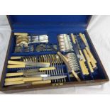 A vintage oak canteen containing a part twelve place setting of Mappin & Webb silver plated cutlery