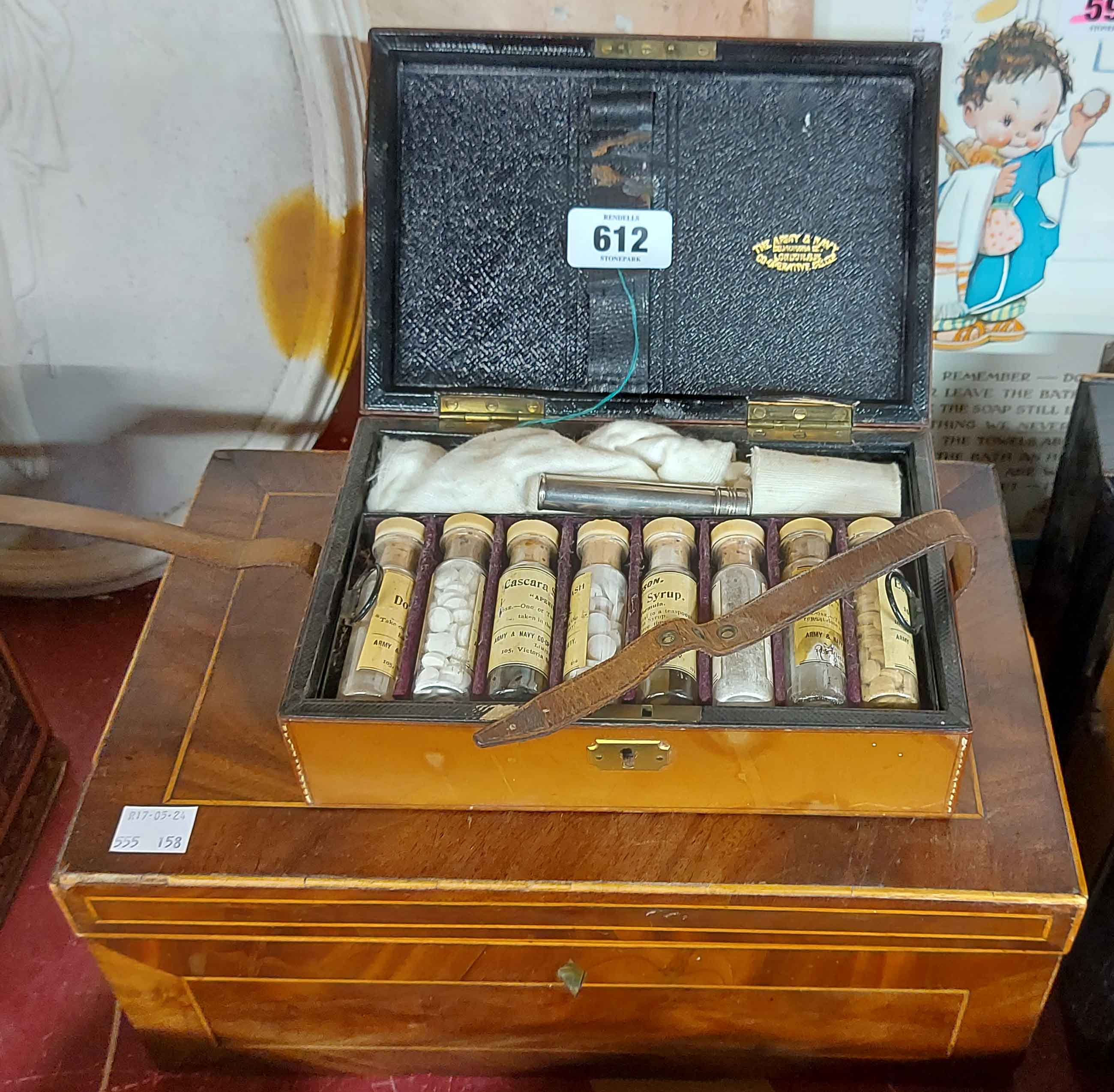 An antique wooden jewellery box - sold with a leather apothecary case containing medical bottles -