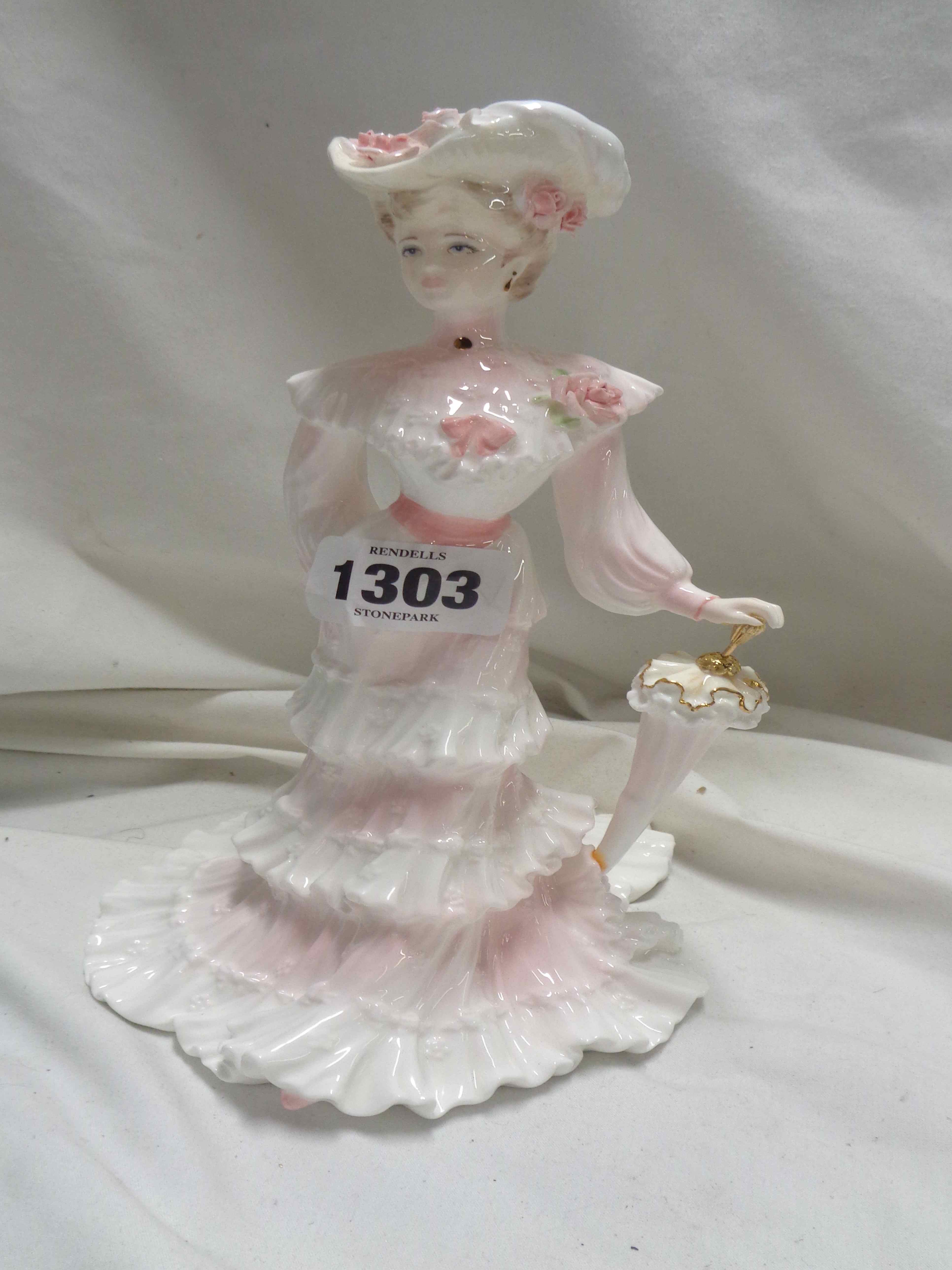 A Coalport bone china figurine 'Lady Alice' from the 'La Belle Epoque' series