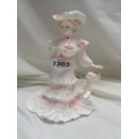 A Coalport bone china figurine 'Lady Alice' from the 'La Belle Epoque' series