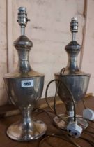 A pair of silver metal baluster style table lamps