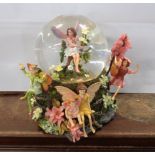 A Danbury Mint Flower Fairies snow globe