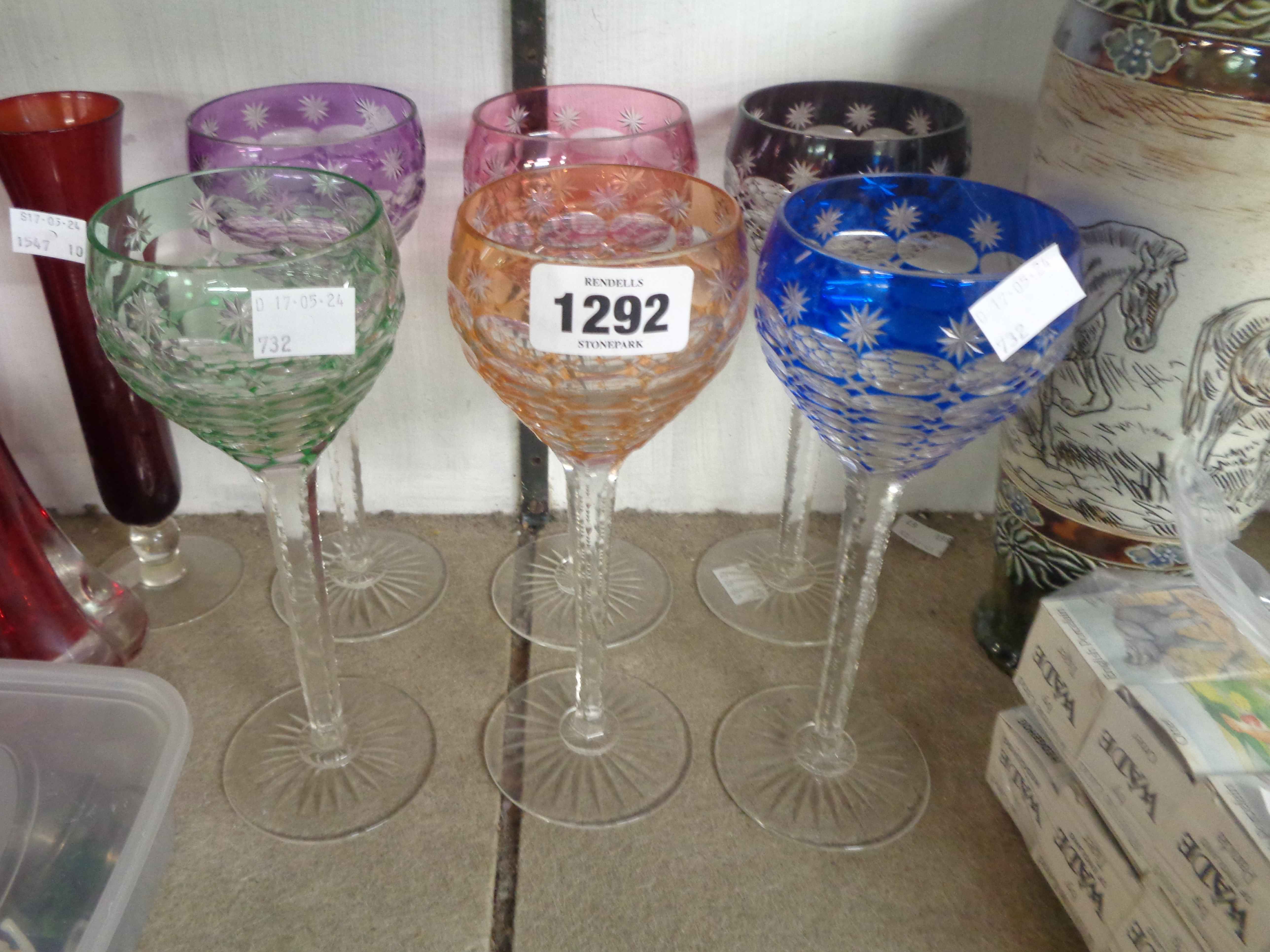 A set of six harlequin hock glasses with coloured cased and cut decoration