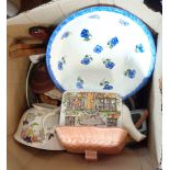 A box containing a quantity of ceramics including teapots, bowls, etc.