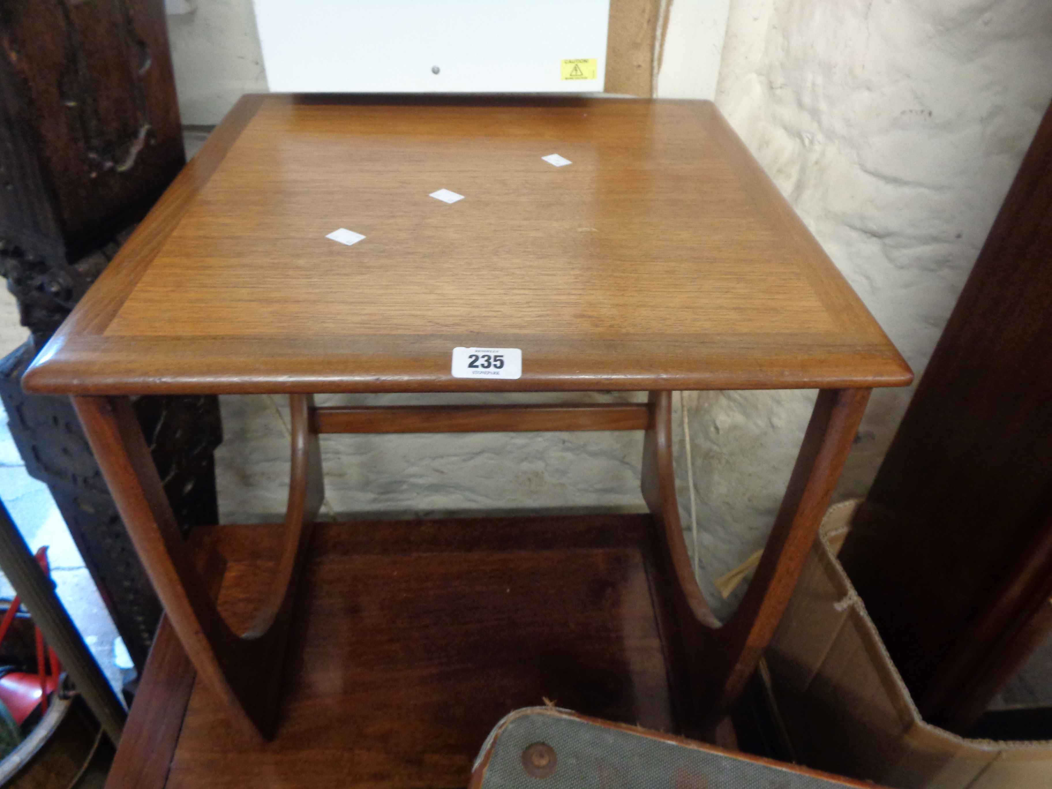 A 50cm G-Plan teak tea table, set on moulded standard ends