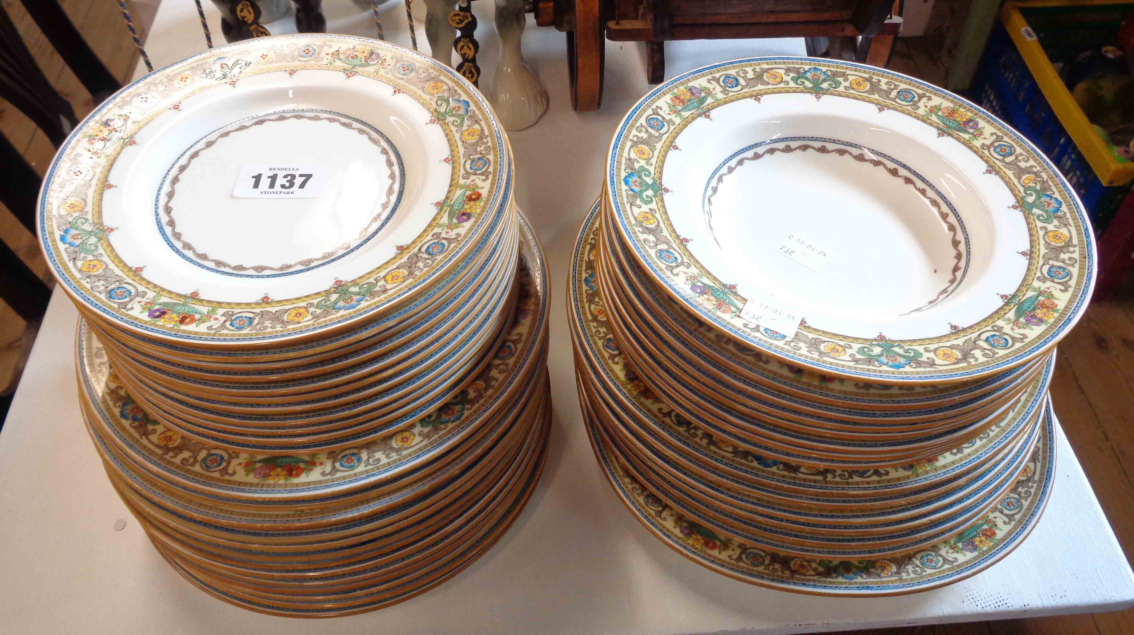 A quantity of Mintons bone china dinner ware decorated in the Plymouth pattern comprising various