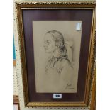 Jad: a gilt framed monochrome head and shoulders portrait of a lady in profile - signed and