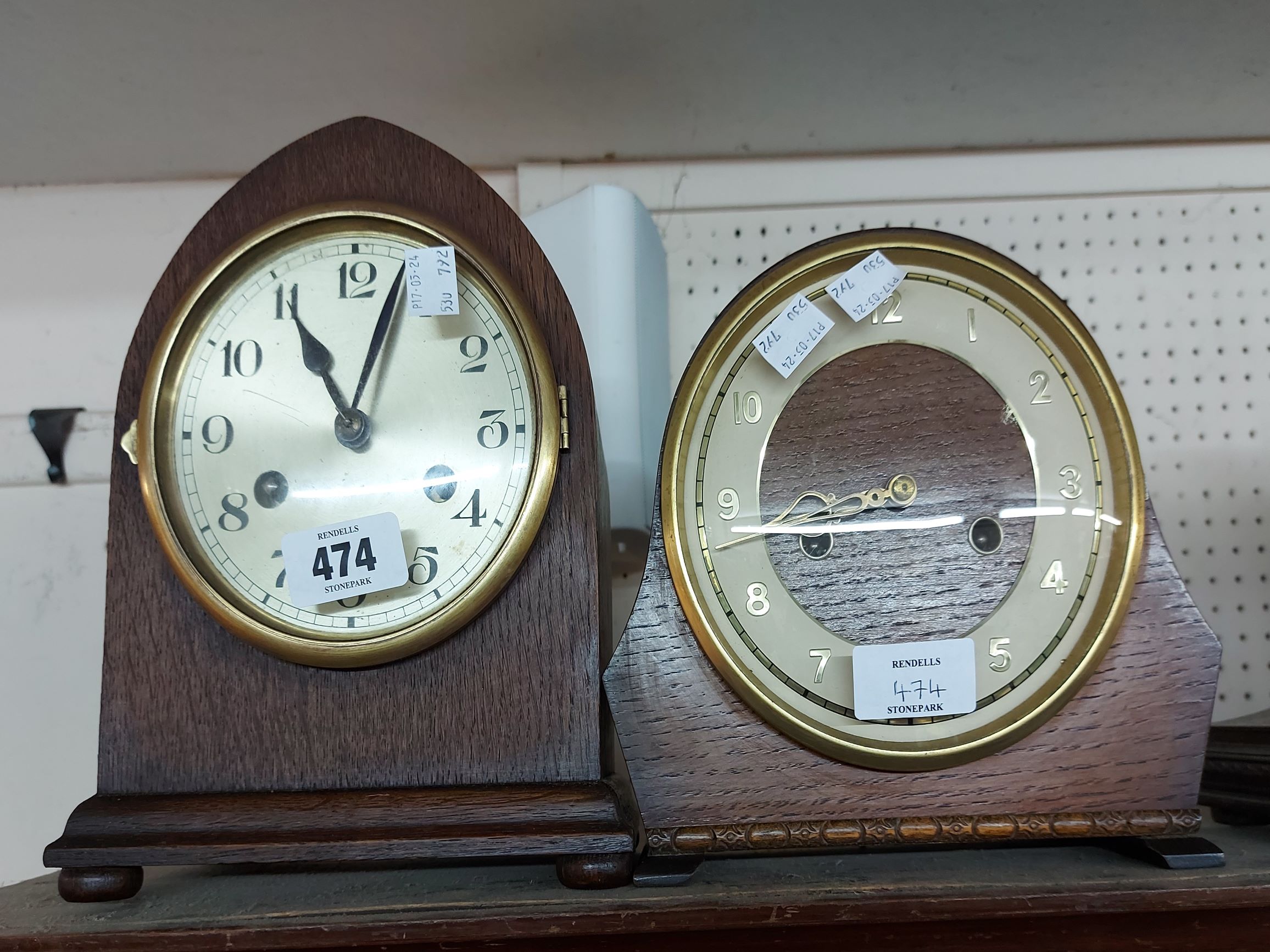 Two vintage oak cased mantel clocks comprising a mitre shaped with eight day gong striking