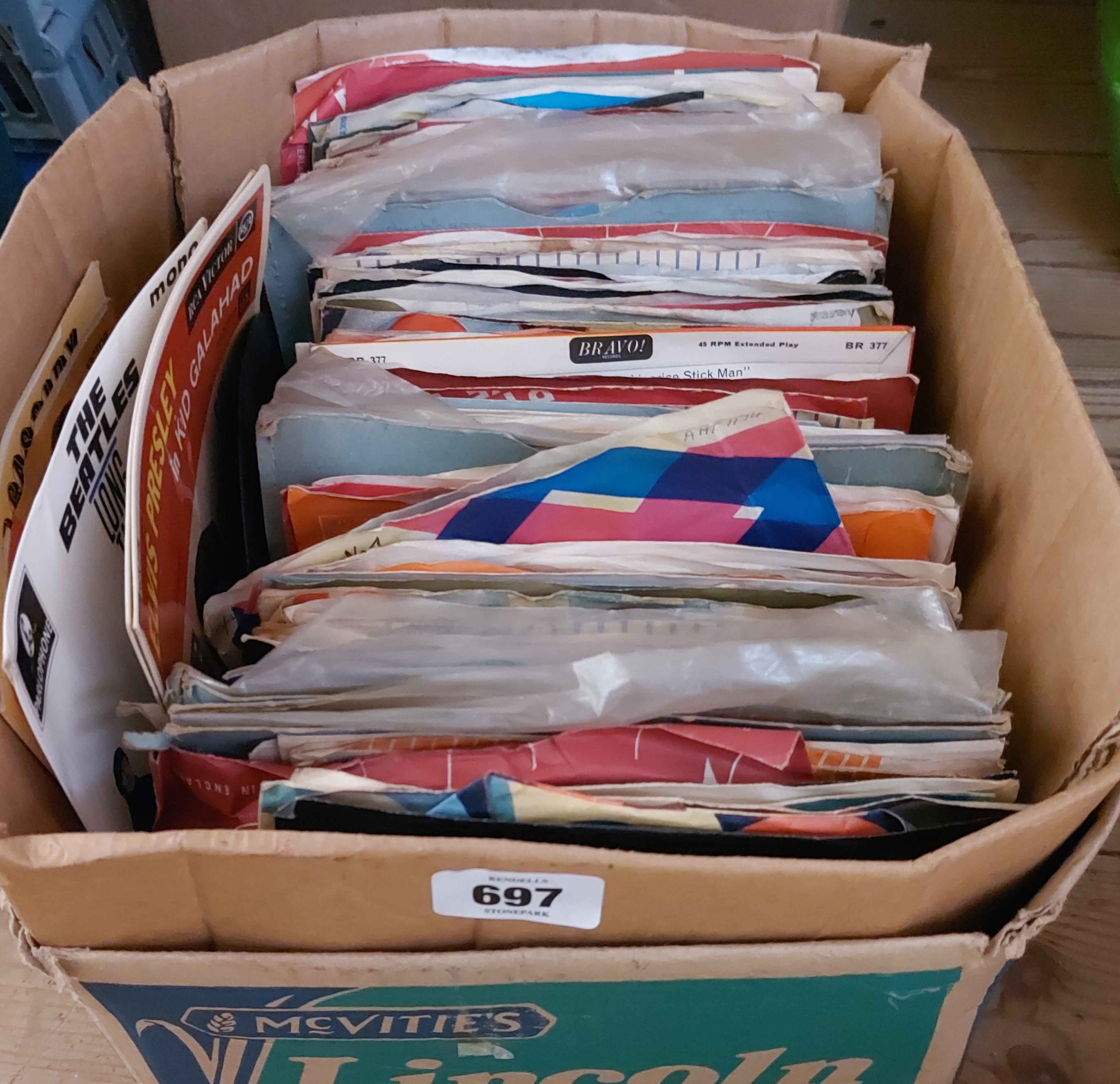 A box containing 45rpm records