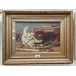 L.W. (manner of Louis Wain): an ornate gilt framed oil on canvas, depicting two kittens fighting