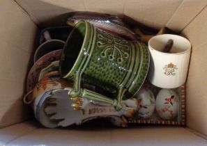 A box containing a quantity of ceramics
