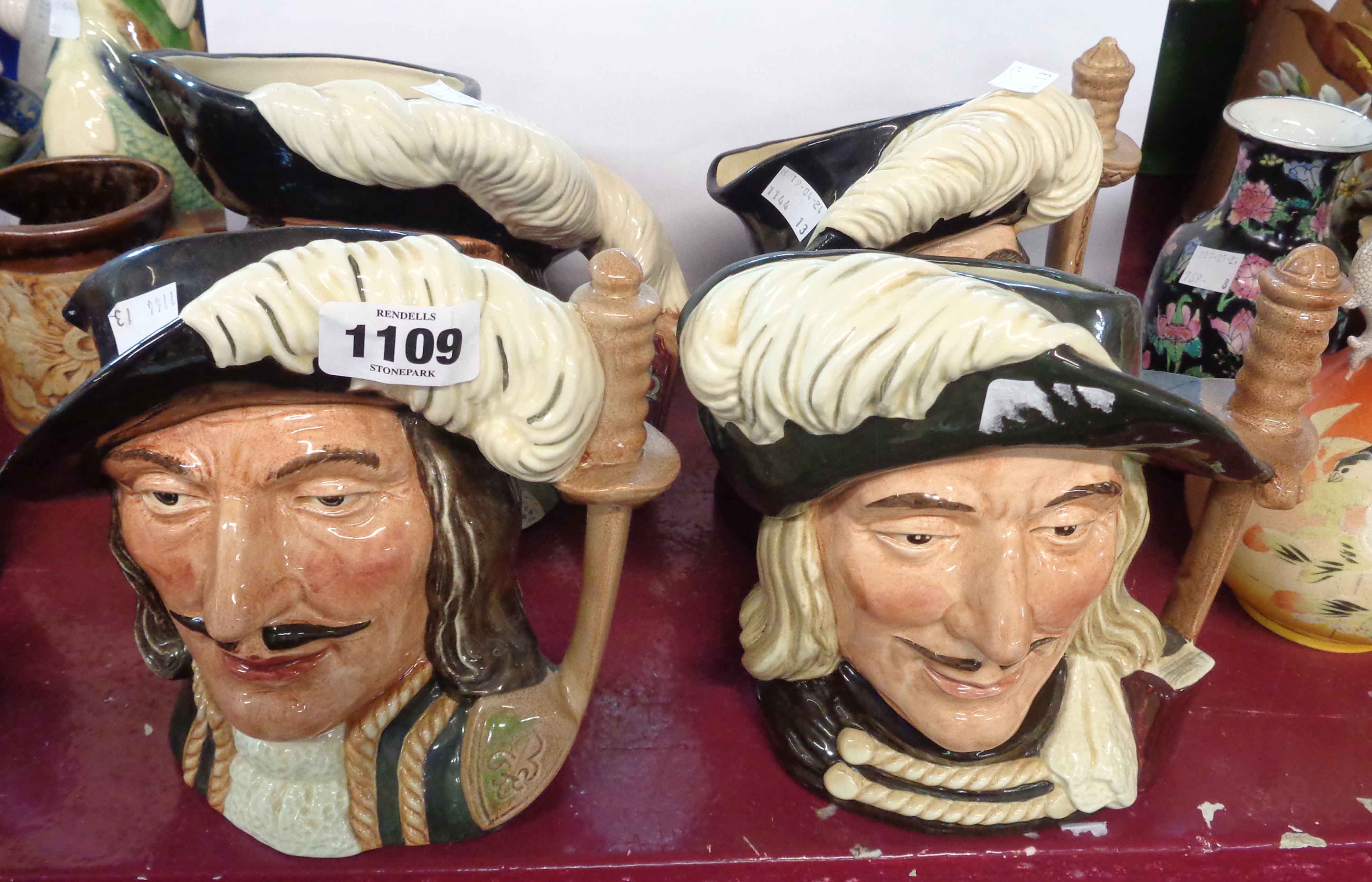 Four large Royal Doulton Musketeer character jugs comprising 'Porthos' D6440, 'Athos' D6452, '