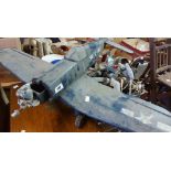 A model of an F4U Corsair plane, with petrol engine - for restoration - sold with spare parts