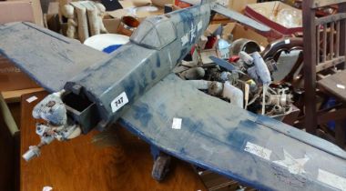 A model of an F4U Corsair plane, with petrol engine - for restoration - sold with spare parts
