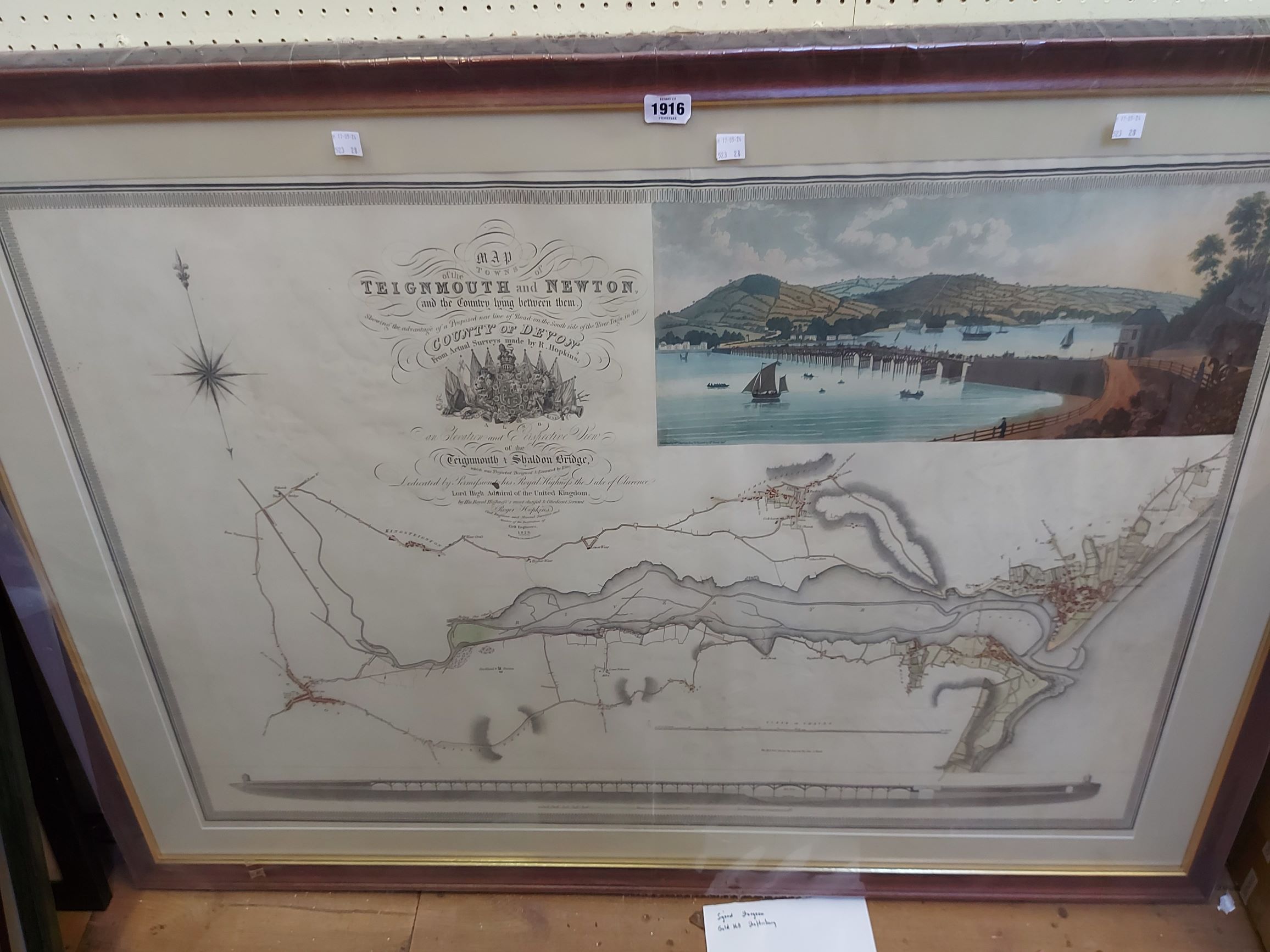 A framed 1828 R. Hopkins map print of Teignmouth and Newton in the county of Devon with coloured
