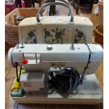 A vintage cased Jones model 461-2 sewing machine