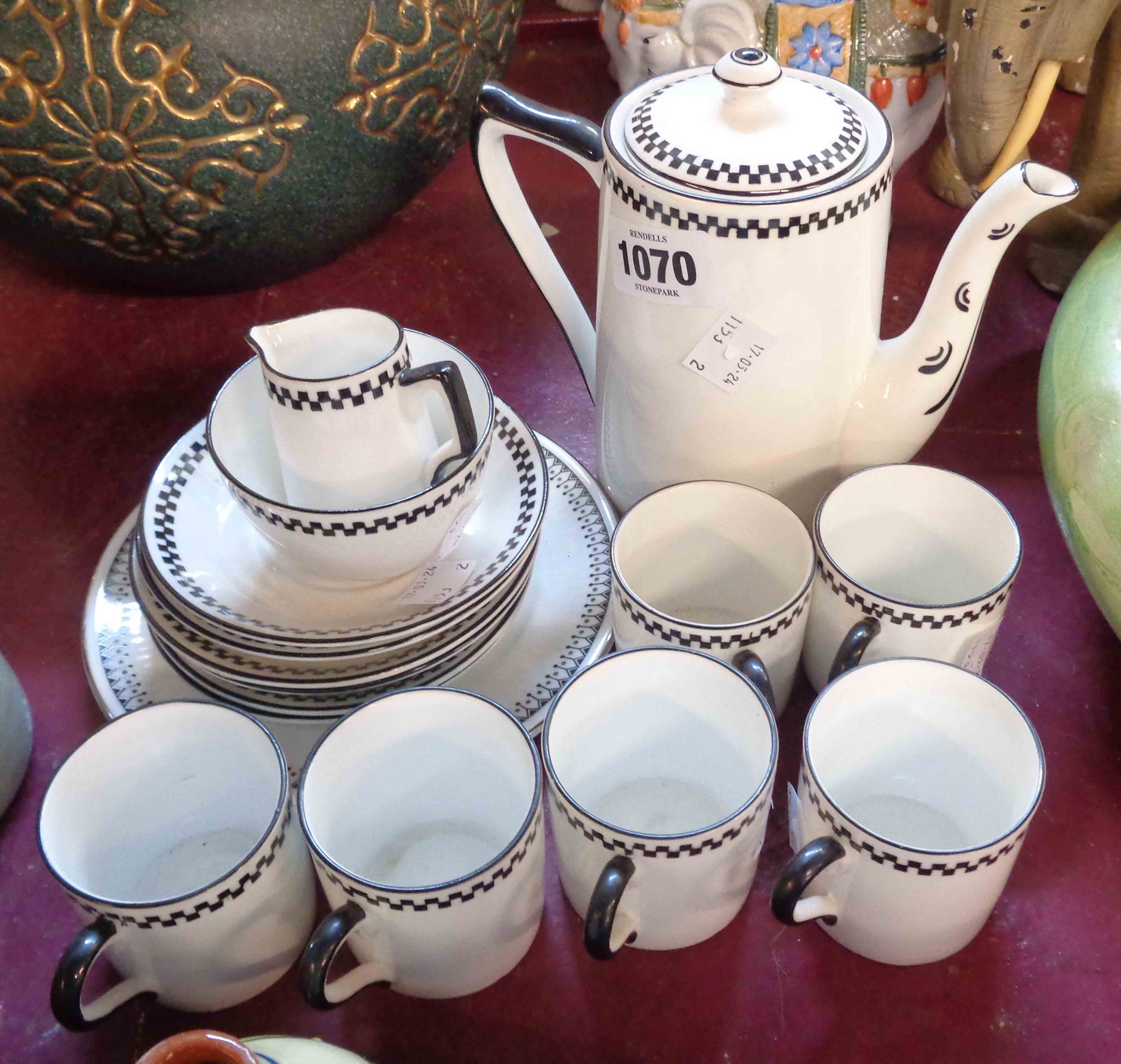 A Balmoral bone china coffee set comprising coffee pot, cream, sugar and six coffee cans and