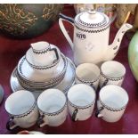 A Balmoral bone china coffee set comprising coffee pot, cream, sugar and six coffee cans and
