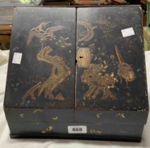 An early 20th Century oriental black lacquered stationery box with fitted interior - a/f