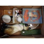 A box containing a quantity of ceramics including 1950's pottery cat, vintage Dunhills sweets box
