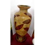 A Doulton Lambeth stoneware vase with impressed leaf decoration