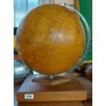 A vintage Philips Challenge globe on wooden stand