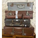 Four assorted vintage suitcases