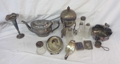 A box containing a quantity of silver plated items including egg coddler and teapot, etc. - sold