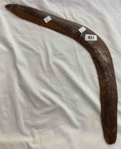 A hand carved Australian Aboriginal hunting boomerang