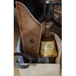 A box containing aquantity of collectable items, including Wade Bell's whisky decanters, a golden