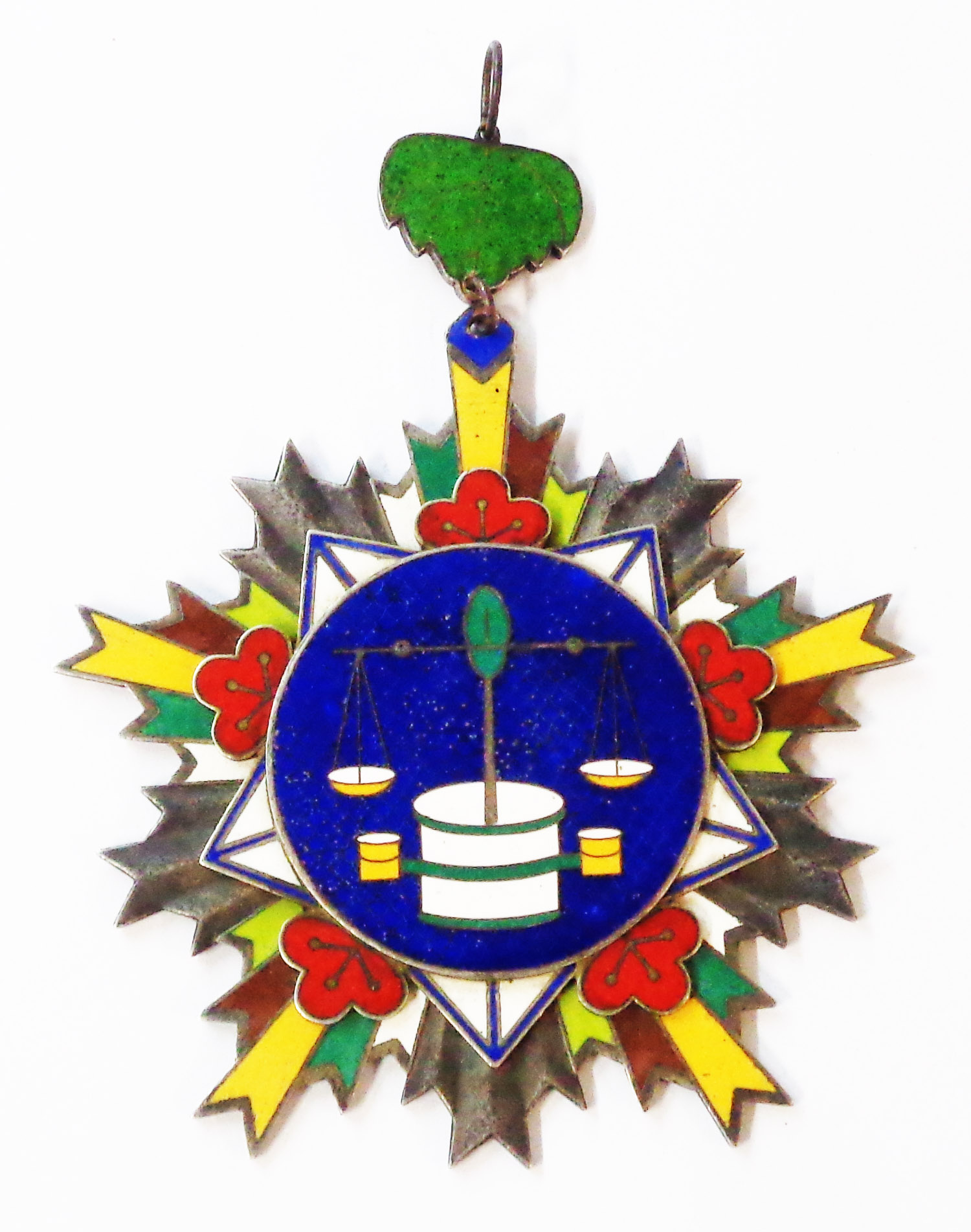 A large Chinese enamelled white metal pendant medallion from Hon Wen Chang province, with scales