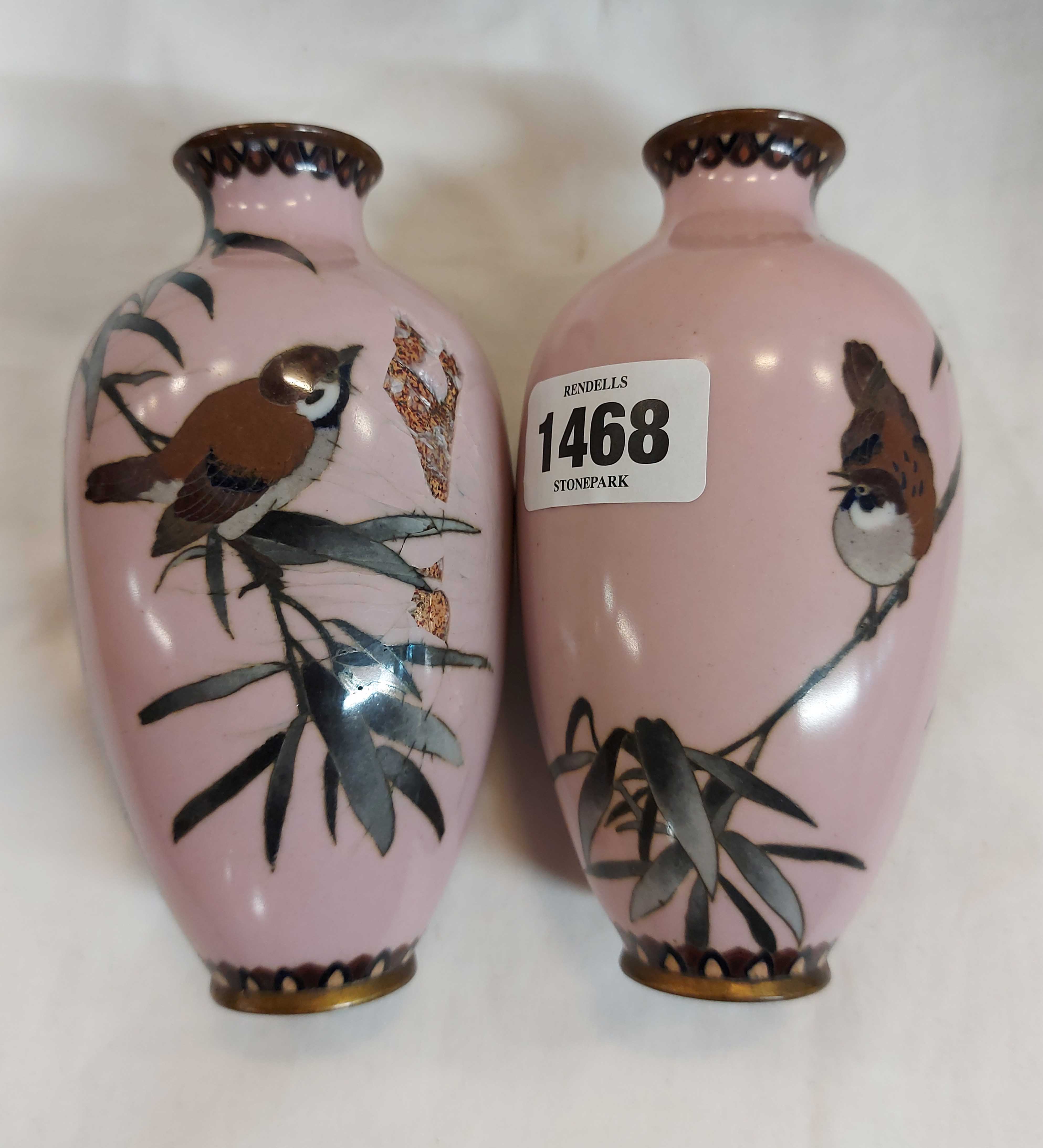A pair of small cloisonné vase, depicting perched birds set on a pink ground