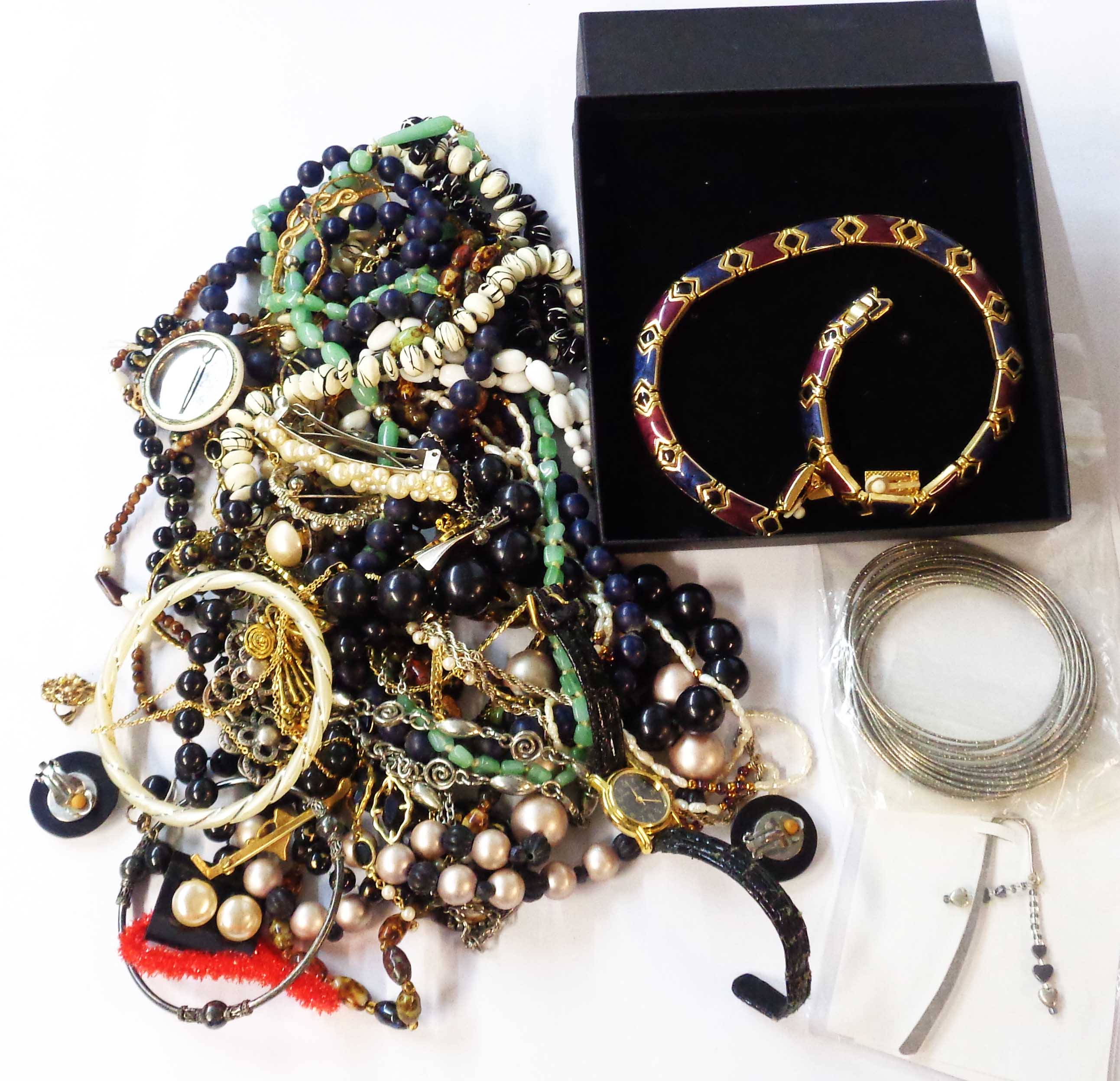 A box containing a quantity of costume and other jewellery including a blister pearl necklace and