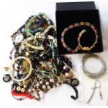 A box containing a quantity of costume and other jewellery including a blister pearl necklace and