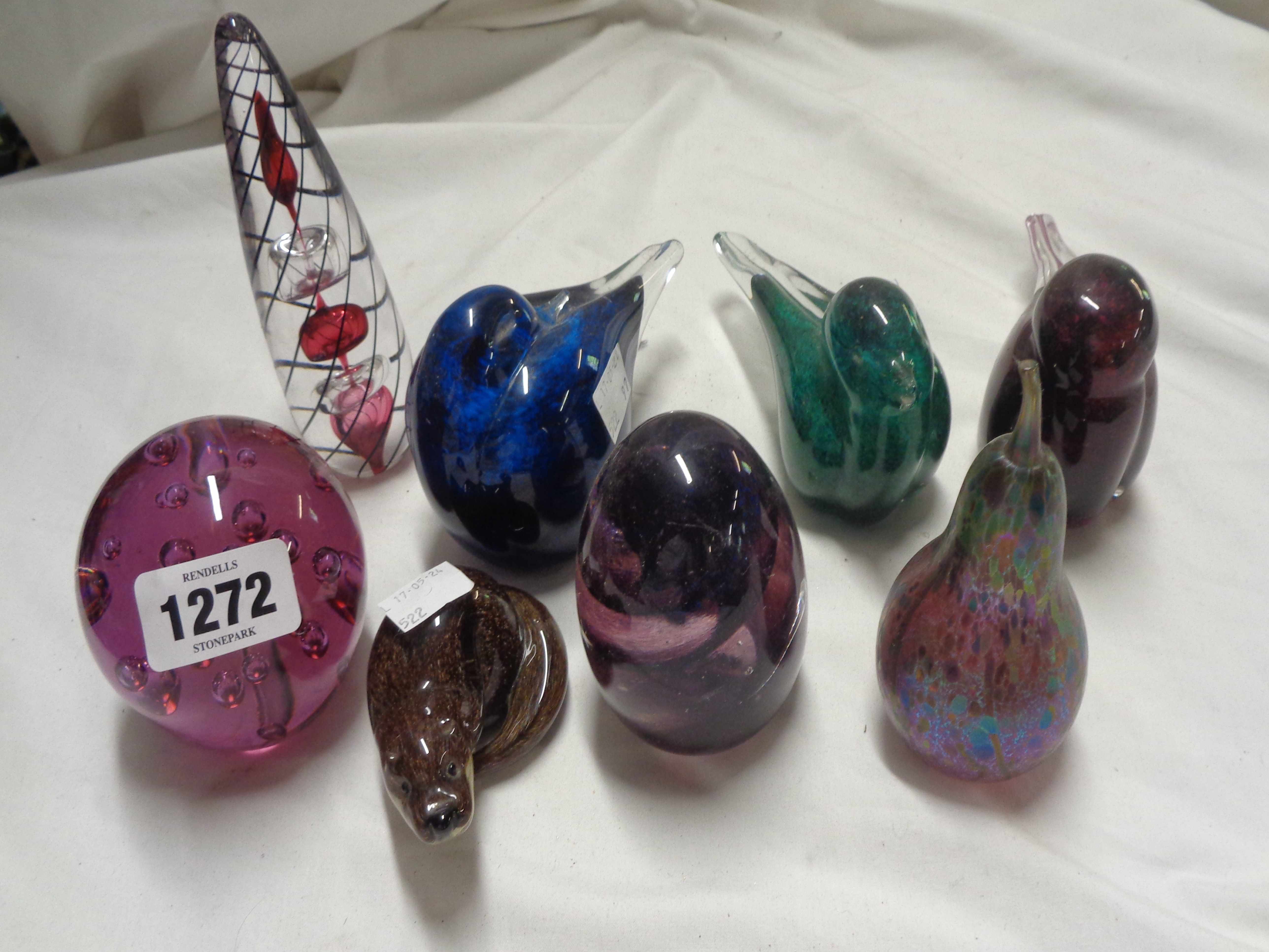 Eight glass paperweights including Langham Glass otter, birds, etc.