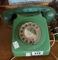 A vintage green dial telephone