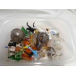 A tub containing a quantity of glass lampwork animal figurines, 'snow baby', Christmas cake