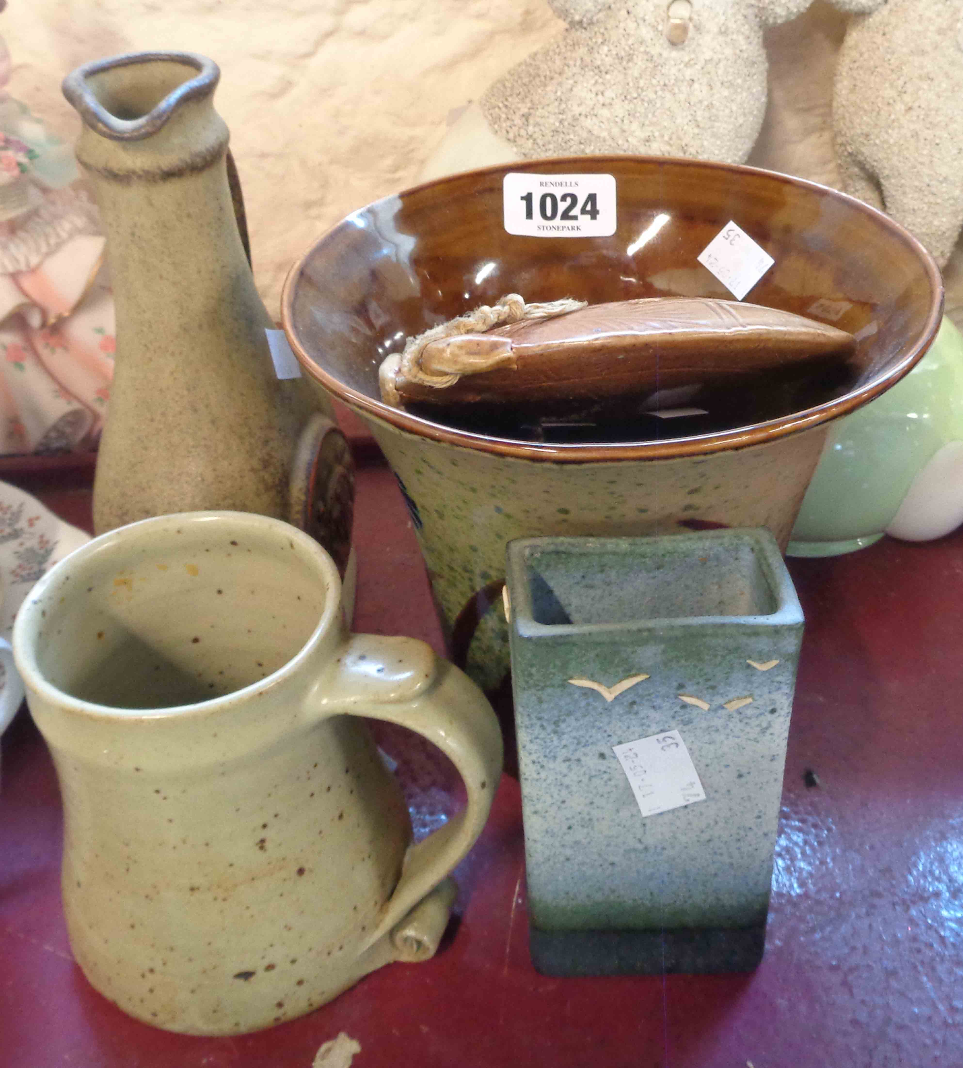 A quantity of Studio Pottery including Leach Pottery St. Ives tankard, moon flask, etc.