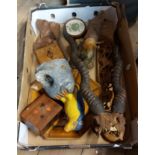 A box containing a quantity of collectable wooden items including a pair of mounted horns, a painted